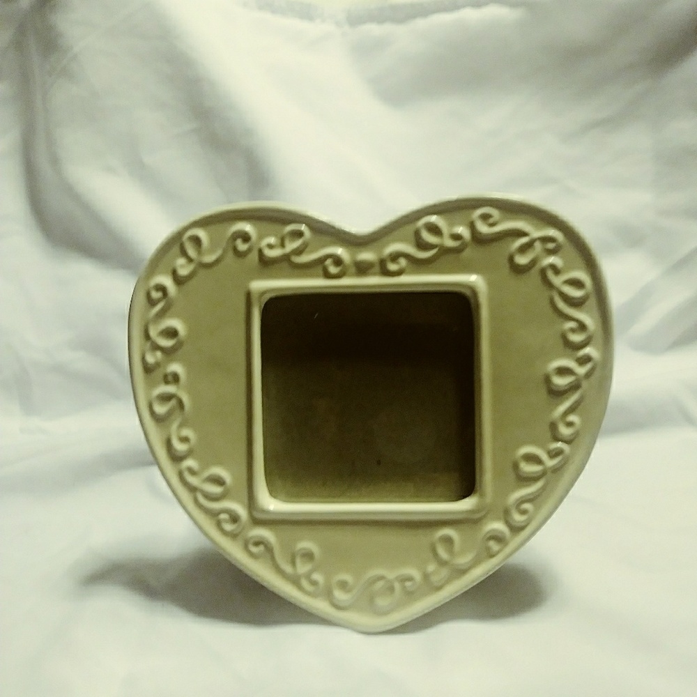Porcelain picture frame by Carr